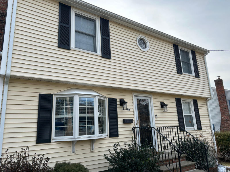 Vinyl siding installation project in Massachusetts by M&V Construction